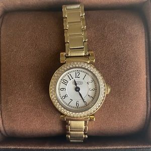 COACH gold womens watch with diamond detail